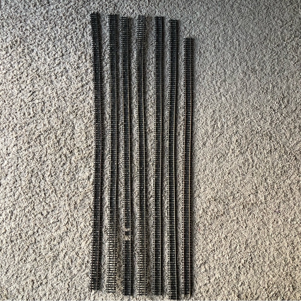 7 vintage train tracks. HO Scale